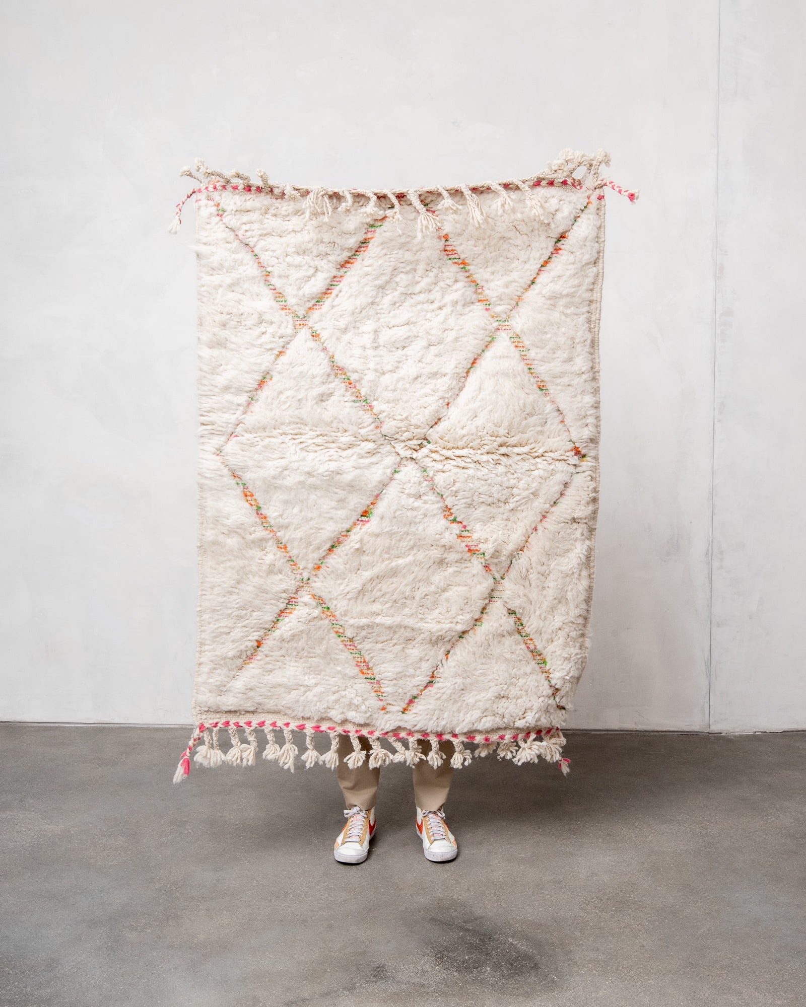 Modern, designer, handcrafted Berber rug from Morocco. Beniourain carpet with beautiful colours and patterns and fluffy wool texture.
